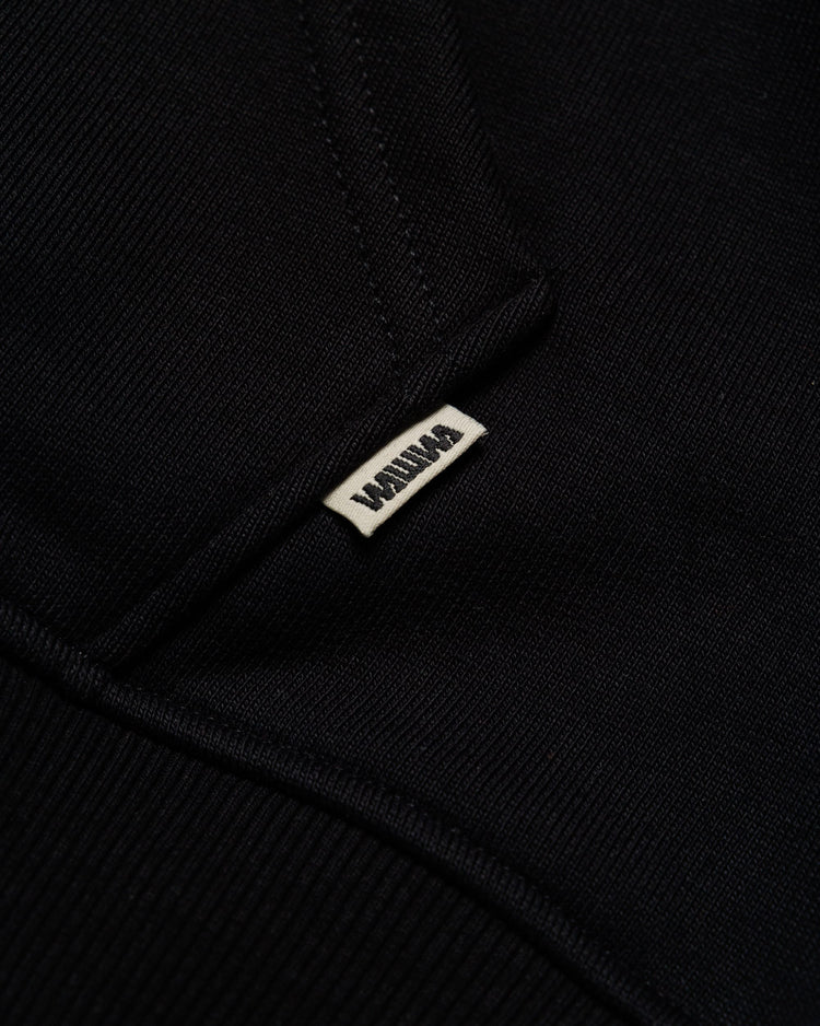 Heavyweight Two-Way Zip Hoody - Black — Hem label branding detail