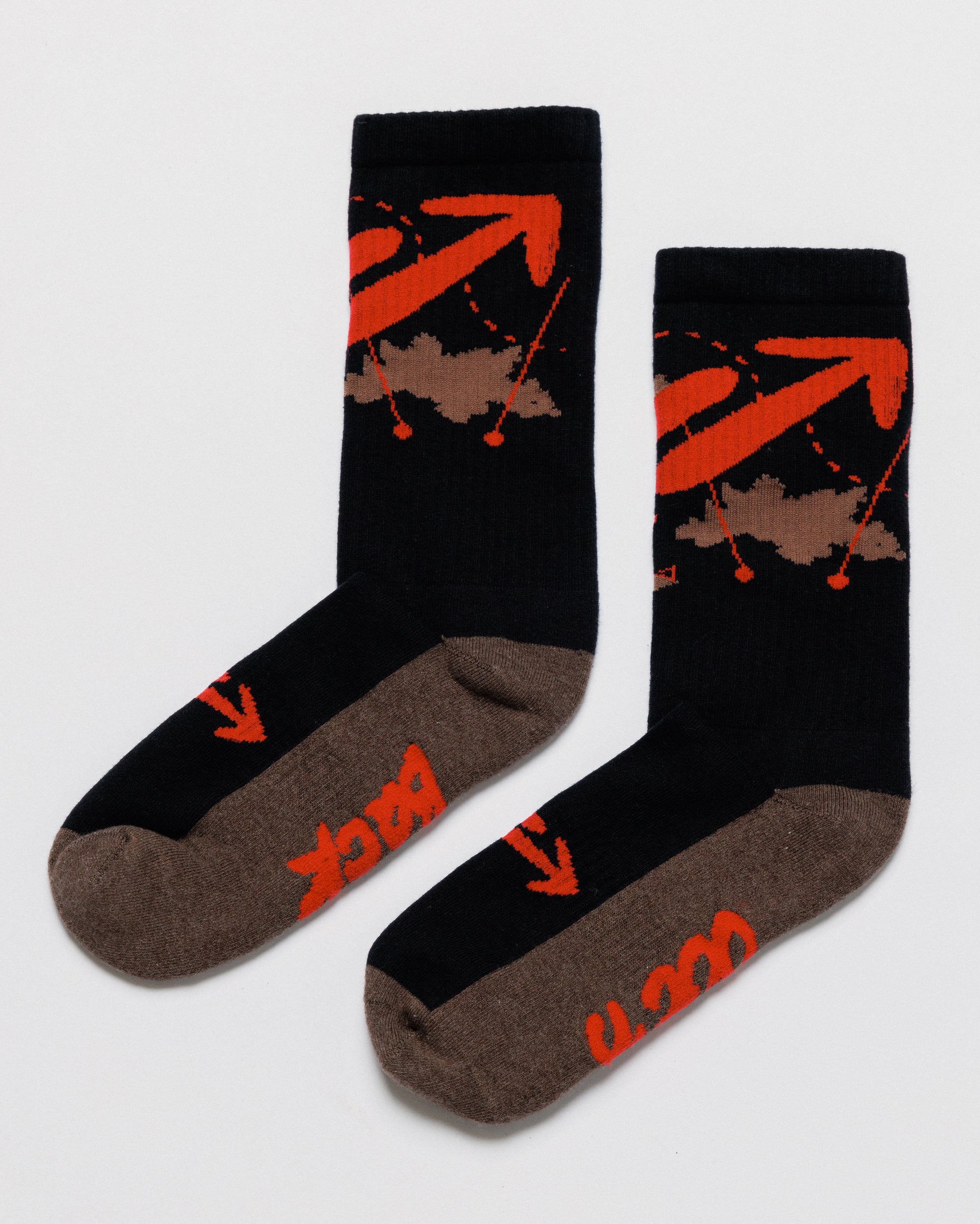Outnback Running Socks in black and red, pair angled showing design and sole