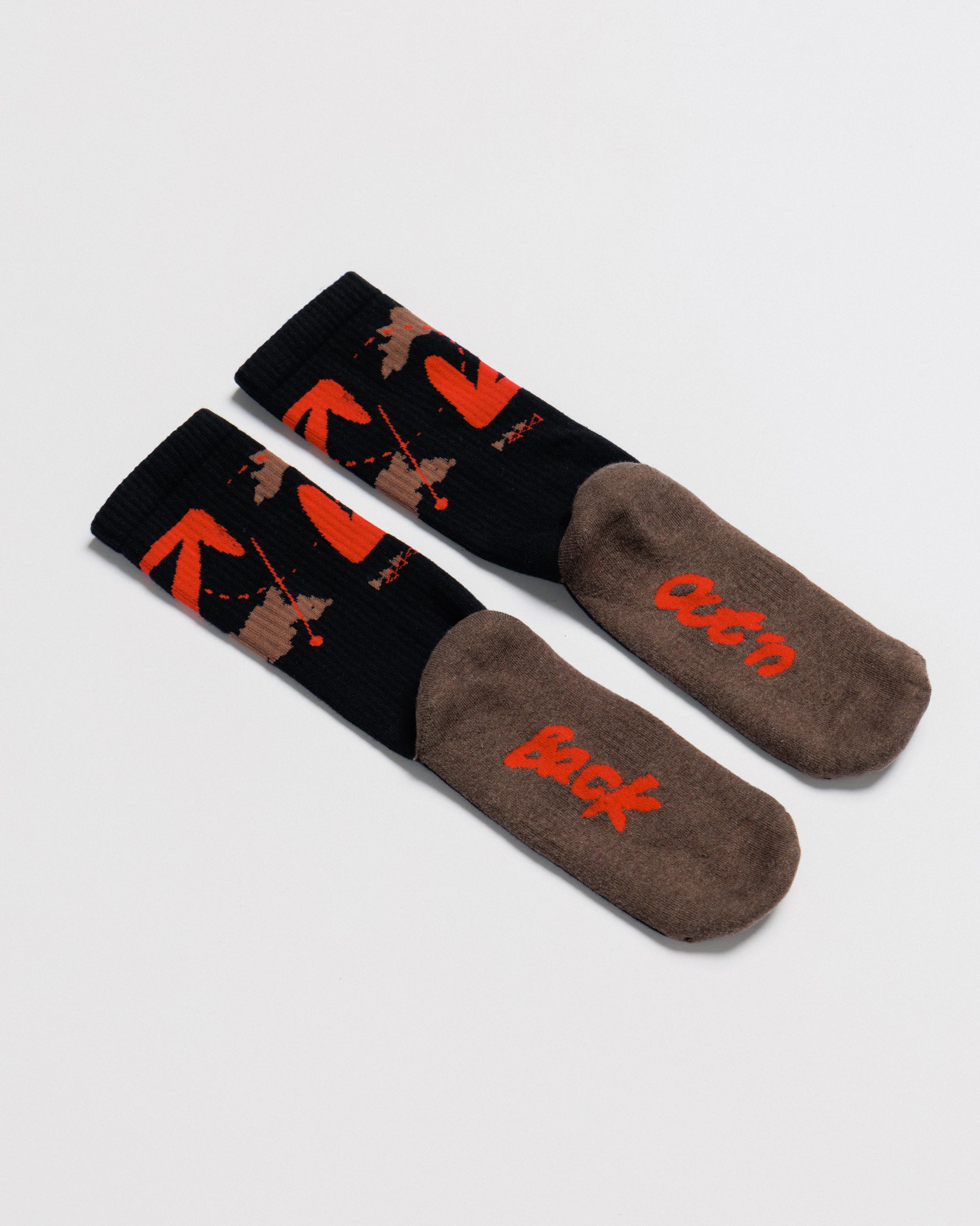 Outnback Running Socks in black and red, sole detail with out'n back branding