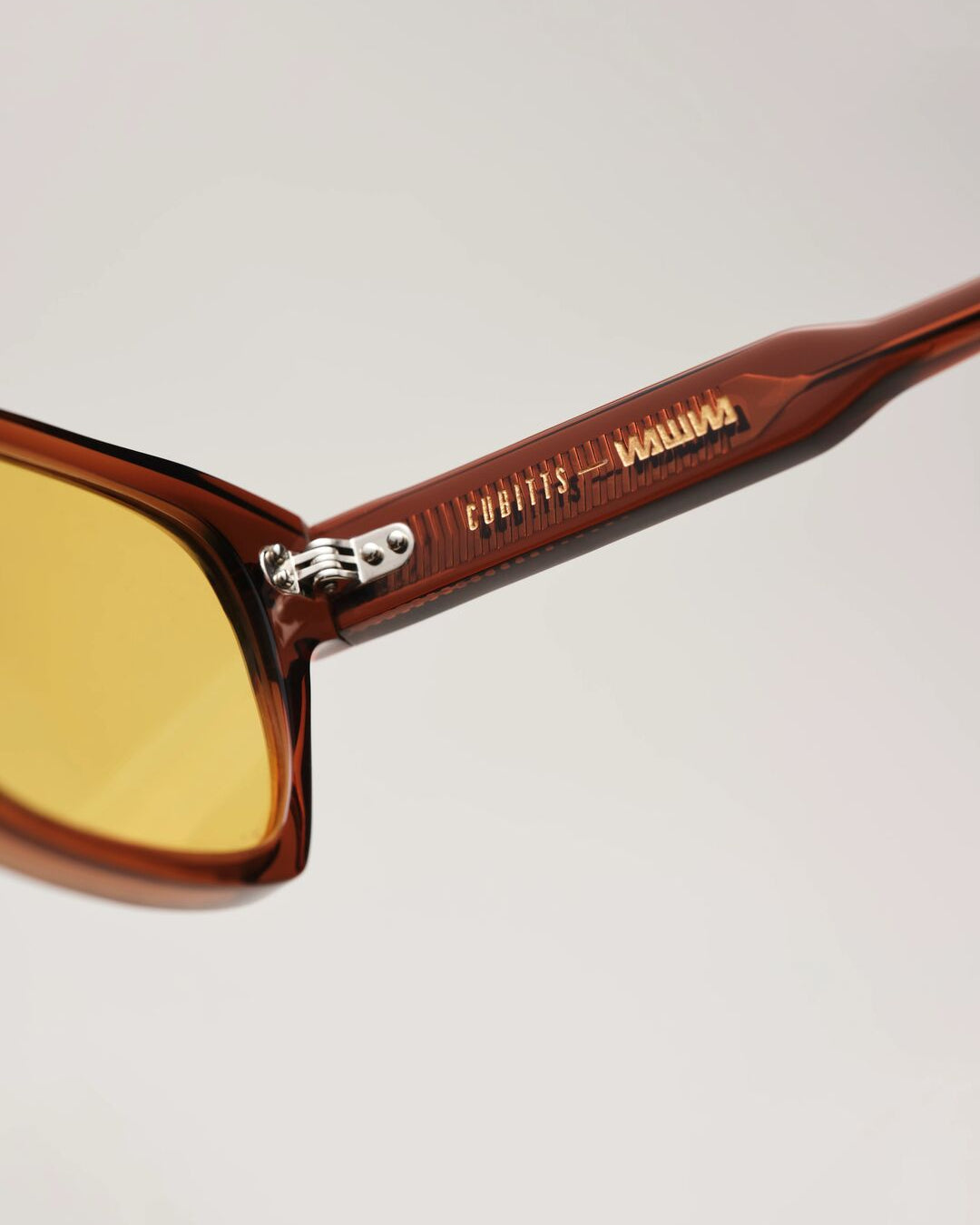 Cubitts and WAWWA engraving detail on Solaris Sunglasses coconut temple arm