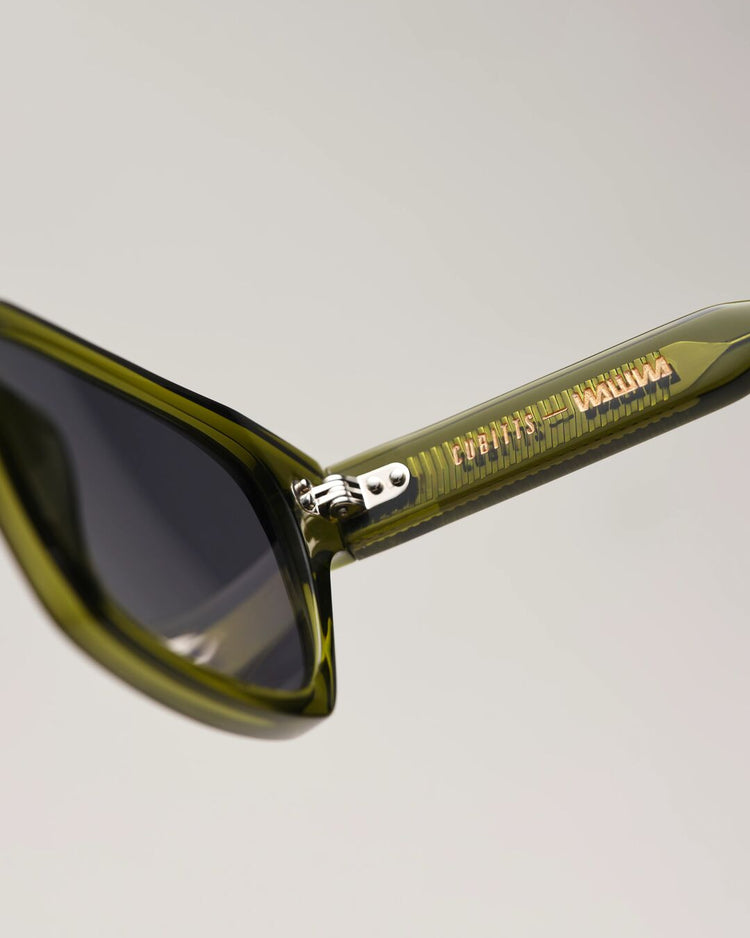 Cubitts and WAWWA engraving detail on Solaris Sunglasses khaki temple arm