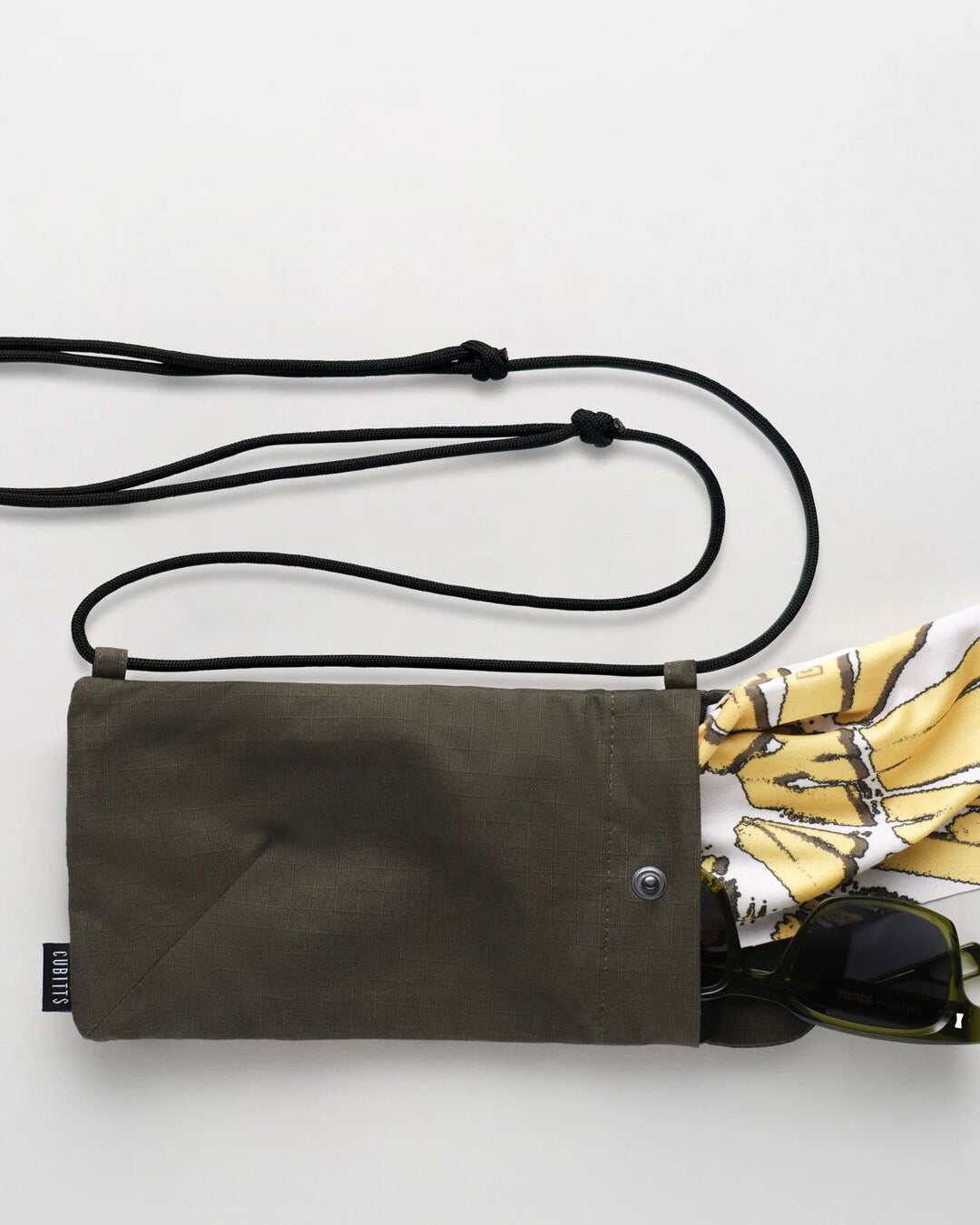Khaki Sunnies Sling with printed lens cloth and sunglasses