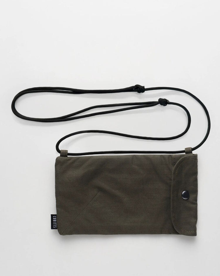 WAWWA x Cubitts Sunnies Sling in khaki with adjustable cord strap, front view