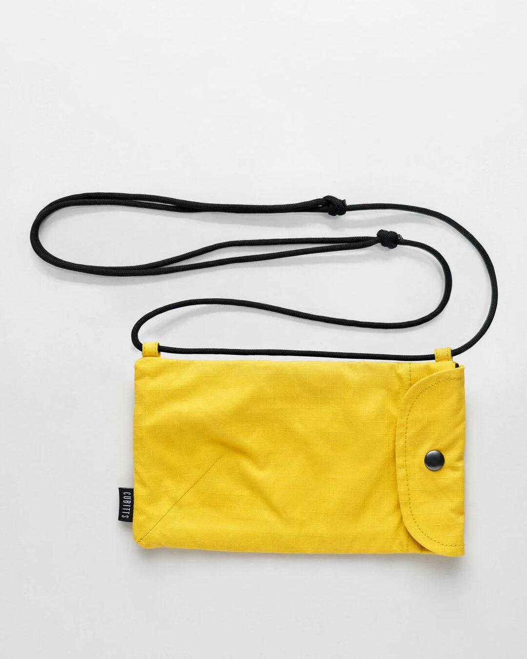 WAWWA x Cubitts Sunnies Sling in yellow with adjustable cord strap, front view