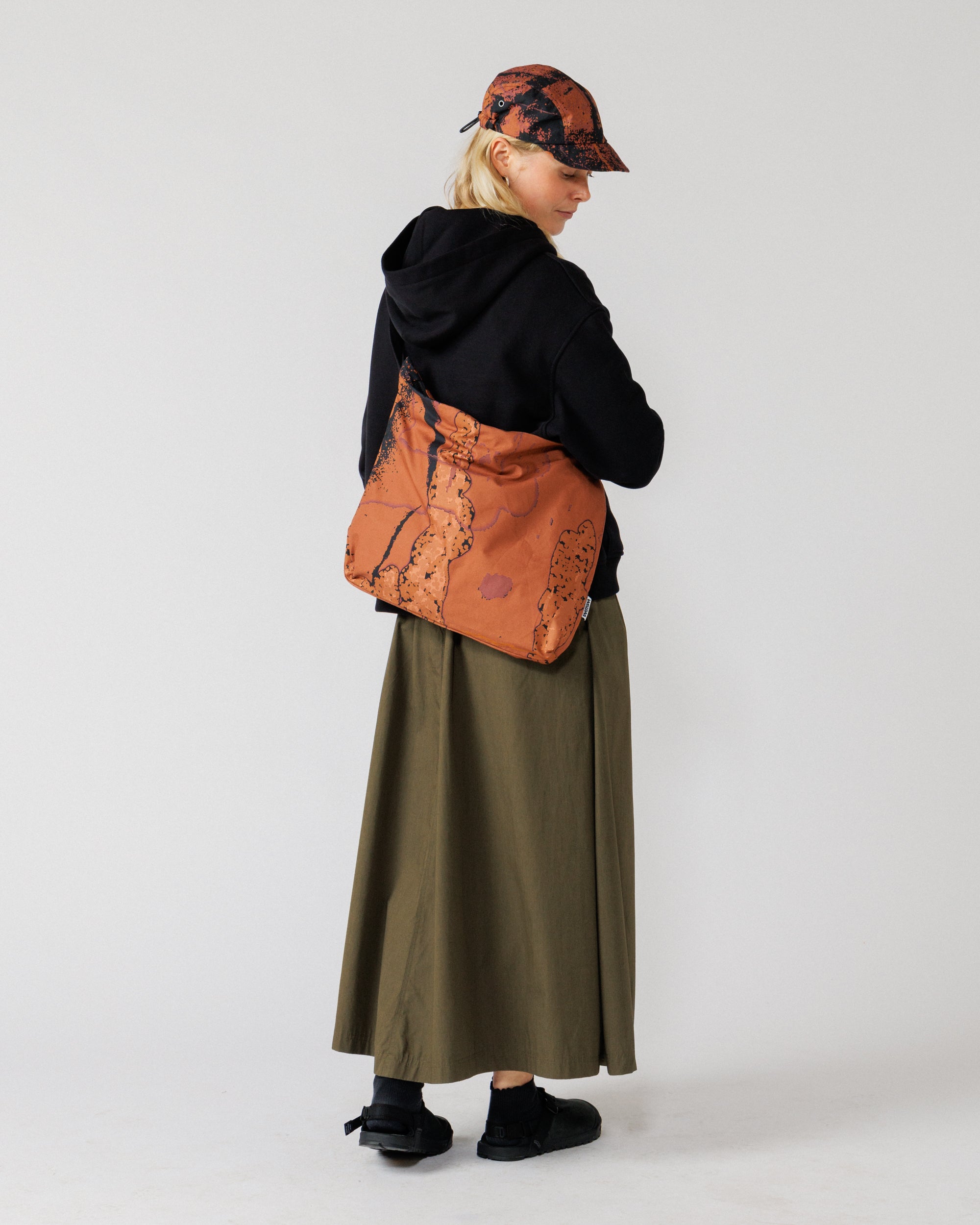 Water Resistant Messenger Bag - Abstract Brick Camo — full-length back view, scale